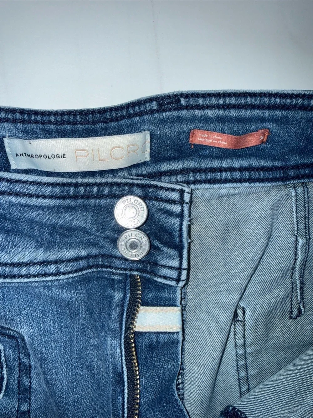 Anthropologie Dark Blue Flare Jeans with Zip Pocket Detail